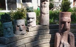 fake rock moai head statues